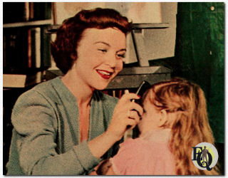 In "Road of Life", Marion Shockley plays Carol Brent, seen here with her daughter Janie. Marion plays Dr. Jim's beautiful, petite wife. All her strength of character and bitter experience are needed to make her marriage a success.