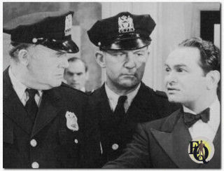 Wade Boteler (L) and Edward G. Robinson (R) in "A Slight Case of Murder" (Warner Bros., Mar 5. 1938).