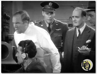 Buck Rogers (Universal, 1939), a futuristic adventure serial that starred Red Barry’s lead Buster Crabbe, gave Boteler a small but important first-chapter role as Professor Morgan–the scientist who, via radio,&nbsp;instructed trapped aviators Buck Rogers (Crabbe) and Buddy Wade (Jackie Moran) in the use of the suspended-animation gas that could alone save their lives.