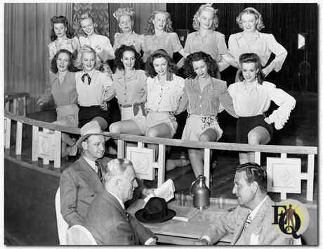 Glorious photo from "I Love a Bandleader" (Columbia, Sep 13. 1945) with seated (L-R): James Burke, Pierre Watkin, and Phil Harris.