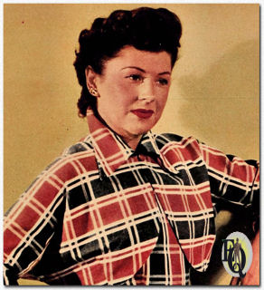 A four-in-one for summer that's four ways wonderful. Worn by Helen Lewis - who is Mary Browne of "Young Dr. Malone" - are two parts of the foursome: solid-color skirt, brief plaid jacket. (Radio and TV Mirror, 1951)