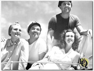 Doris Nolan, Preston Foster, Margaret Lindsay and Allan Jones from a seagoing quartet on board Foster's yacht now that they have completed their current pictures. Foster and miss Nolan appear opposite each other in "Moon over Burma" (Paramount, Dec 11. 1940). Miss Lindsay and Jones are in "There's Magic in Music" (aka "The Hard-Boiled Canary", Paramount, Jun 8. 1941). Foster is one of Hollywood's most enthusiastic yachtsmen and frequently entertains aboard his yacht. (1940)