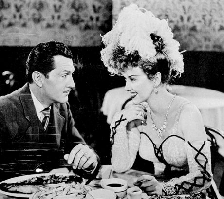 As Roxie, a sexy saloon girl in "Alaska" (1944) with Kent Taylor.