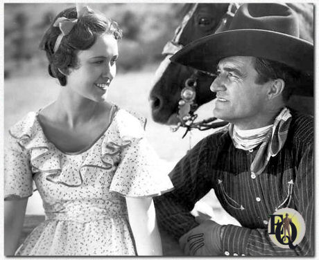 In a Tom Mix Production from 1932 "Fourth Horseman" Margaret Lindsay with Tom Mix.