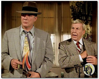 Tom Reese and David Wayne in "Ellery Queen" "The Adventure of the Comic Book Crusader" (NBC, Oct. 2. 1975).