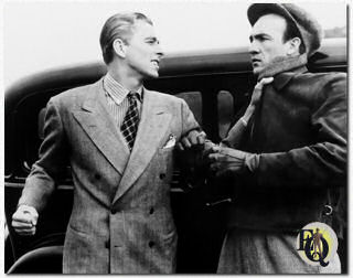 Ronald Reagan in een gevecht met Elliott Sullivan in Accidents will happen (1938)