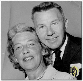 David Wayne, returning home with his wife after European Vacation (Aug 14. 1957)