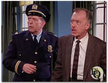 In the "Batman" episode, "The Entrancing Dr. Cassandra" (7 March 1968) David Lewis (R) played Warden Crichton, whilst Bill Zuckert was the Prison Captain.